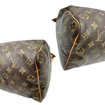 angoli Borsa Louis Vuitton in canvas monogram marrone con parti metalliche dorate; munita di doppi manici stondati, da portare a mano. Completa di dustbag, lucchetto e chiavi, di lusso, usato, ottime condizioni. 