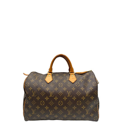 front Borsa Louis Vuitton in canvas monogram marrone con parti metalliche dorate; munita di doppi manici stondati, da portare a mano. Completa di dustbag, lucchetto e chiavi, di lusso, usato, ottime condizioni.