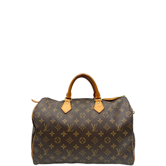 front Borsa Louis Vuitton in canvas monogram marrone con parti metalliche dorate; munita di doppi manici stondati, da portare a mano. Completa di dustbag, lucchetto e chiavi, di lusso, usato, ottime condizioni.