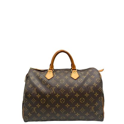 retro Borsa Louis Vuitton in canvas monogram marrone con parti metalliche dorate; munita di doppi manici stondati, da portare a mano. Completa di dustbag, lucchetto e chiavi, di lusso, usato, ottime condizioni. 