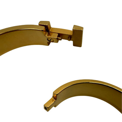 Bracciale Hèrmes in metallo dorato con smalto opaco blu. Completo di corredo, di lusso, originale, ottime condizioni. 