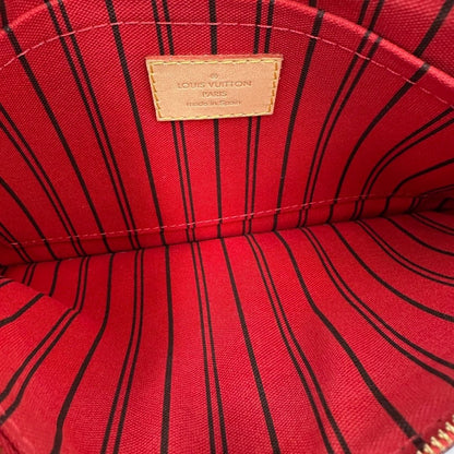 Borsa Louis Vuitton Neverfull MM in canvas marrone monogram con finiture in vacchetta naturale e parti metalliche dorate; munita di doppi manici e una pochette estraibile. Indossabile a spalla. Completa di dustbag, di lusso, originale, ottime condizioni. 