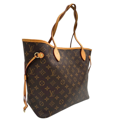 lato Borsa Louis Vuitton Neverfull MM in canvas marrone monogram con finiture in vacchetta naturale e parti metalliche dorate; munita di doppi manici e una pochette estraibile. Indossabile a spalla. Completa di dustbag, di lusso, originale, ottime condizioni. 