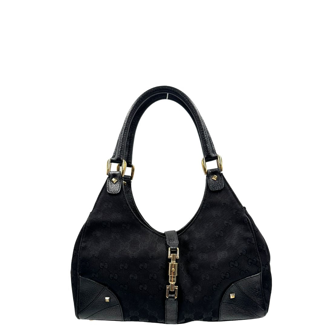 front Borsa Gucci in tessuto GG nero con finiture in pelle tono su tono e parti metalliche dorate; munita di doppi manici stondati. Completa di dustbag, di lusso, originale, ottime condizioni. 