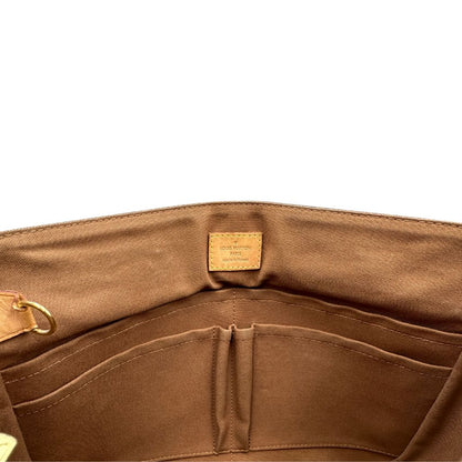 interno Cartella Louis Vuitton in canvas marrone monogram e parti metalliche dorate. Munita di una tracolla in tessuto regolabile, di lusso, originale, ottime condizioni, usata.