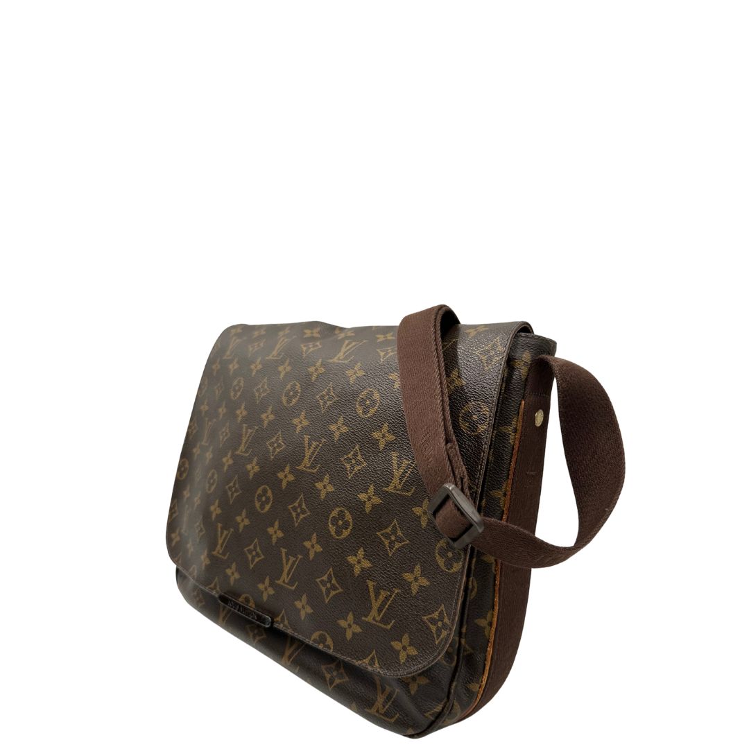 lato Cartella Louis Vuitton in canvas marrone monogram e parti metalliche dorate. Munita di una tracolla in tessuto regolabile, di lusso, originale, ottime condizioni, usata. 