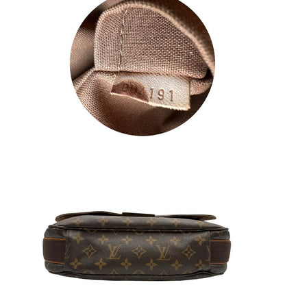 base Cartella Louis Vuitton in canvas marrone monogram e parti metalliche dorate. Munita di una tracolla in tessuto regolabile, di lusso, originale, ottime condizioni, usata. 