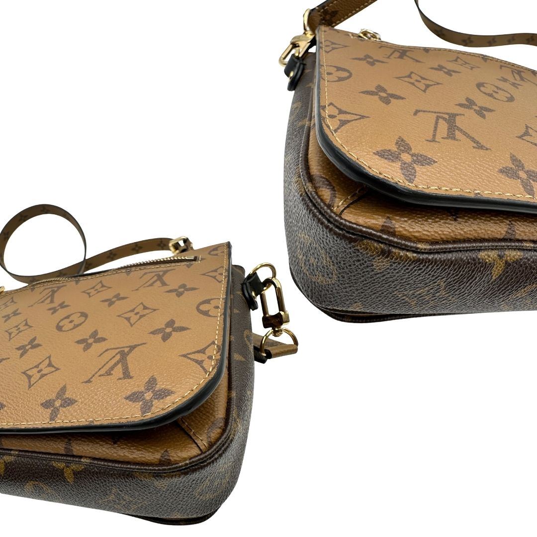 angoli Borsa Louis Vuitton Métis in canvas marrone monogram reverse con parti metalliche dorate; munita di un manico singolo e una tracolla amovibile e regolabile. Completa di scatola, di lusso, originale, ottime condizioni, usata.
