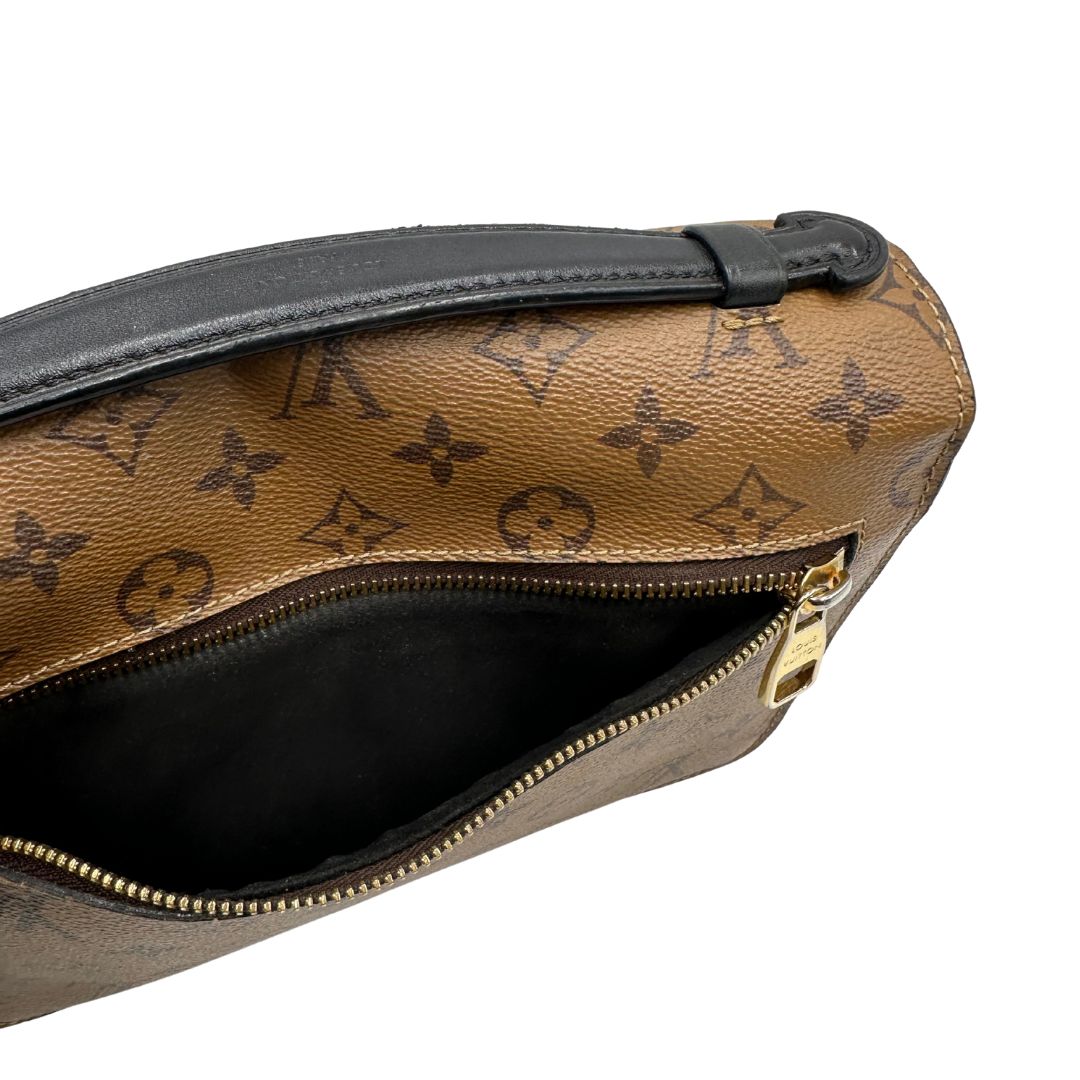 interno Borsa Louis Vuitton Métis in canvas marrone monogram reverse con parti metalliche dorate; munita di un manico singolo e una tracolla amovibile e regolabile. Completa di scatola, di lusso, originale, ottime condizioni, usata. 