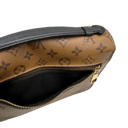 interno Borsa Louis Vuitton Métis in canvas marrone monogram reverse con parti metalliche dorate; munita di un manico singolo e una tracolla amovibile e regolabile. Completa di scatola, di lusso, originale, ottime condizioni, usata. 