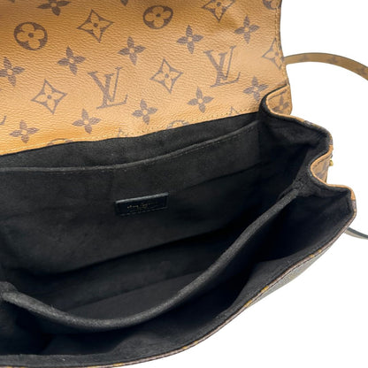 interno Borsa Louis Vuitton Métis in canvas marrone monogram reverse con parti metalliche dorate; munita di un manico singolo e una tracolla amovibile e regolabile. Completa di scatola, di lusso, originale, ottime condizioni, usata. 