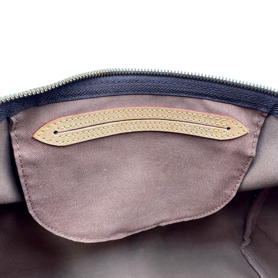 interno Borsa Speedy 35 in canvas marrone monogram con finiture in vacchetta naturale e parti metalliche dorate; munita di doppi manici stondati e una tracolla amovibile e regolabile. Completa di corredo, lucchetto e chiavi, di lusso, originale, ottime condizioni. 