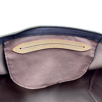 interno Borsa Speedy 35 in canvas marrone monogram con finiture in vacchetta naturale e parti metalliche dorate; munita di doppi manici stondati e una tracolla amovibile e regolabile. Completa di corredo, lucchetto e chiavi, di lusso, originale, ottime condizioni. 