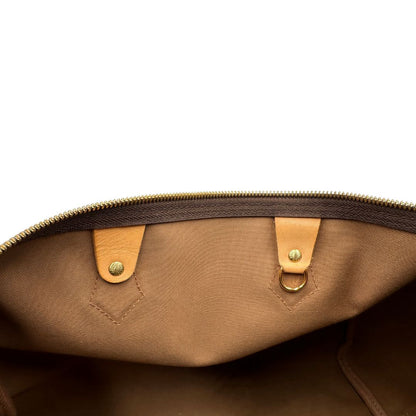 interno Borsa Speedy 35 in canvas marrone monogram con finiture in vacchetta naturale e parti metalliche dorate; munita di doppi manici stondati e una tracolla amovibile e regolabile. Completa di corredo, lucchetto e chiavi, di lusso, originale, ottime condizioni. 