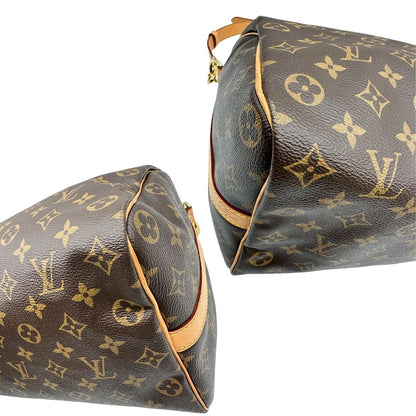 angoli Borsa Speedy 35 in canvas marrone monogram con finiture in vacchetta naturale e parti metalliche dorate; munita di doppi manici stondati e una tracolla amovibile e regolabile. Completa di corredo, lucchetto e chiavi, di lusso, originale, ottime condizioni. 