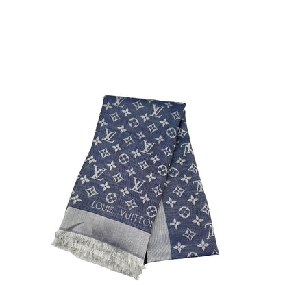 Stola Louis Vuitton in 60% lana e 40% seta bicolore blu e grigio, con trama monogram e bordi sfrangiati. Completa di scatola. Originale, usata, di lusso, in condizioni eccellenti.