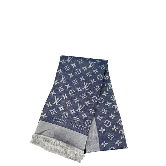 Stola Louis Vuitton in 60% lana e 40% seta bicolore blu e grigio, con trama monogram e bordi sfrangiati. Completa di scatola. Originale, usata, di lusso, in condizioni eccellenti.