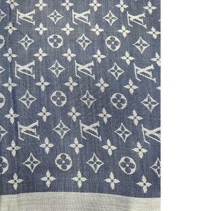 Stola Louis Vuitton in 60% lana e 40% seta bicolore blu e grigio, con trama monogram e bordi sfrangiati. Completa di scatola. Originale, usata, di lusso, in condizioni eccellenti.