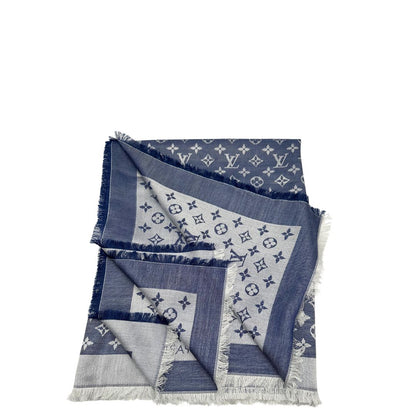 Stola Louis Vuitton in 60% lana e 40% seta bicolore blu e grigio, con trama monogram e bordi sfrangiati. Completa di scatola. Originale, usata, di lusso, in condizioni eccellenti.