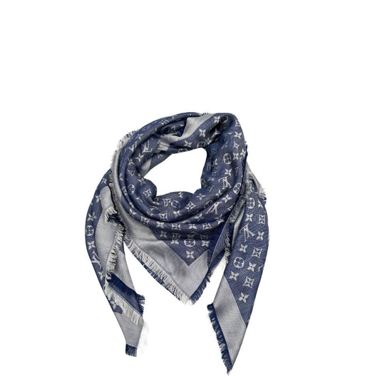 Stola Louis Vuitton in 60% lana e 40% seta bicolore blu e grigio, con trama monogram e bordi sfrangiati. Completa di scatola. Originale, usata, di lusso, in condizioni eccellenti.