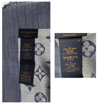 Stola Louis Vuitton in 60% lana e 40% seta bicolore blu e grigio, con trama monogram e bordi sfrangiati. Completa di scatola. Originale, usata, di lusso, in condizioni eccellenti.