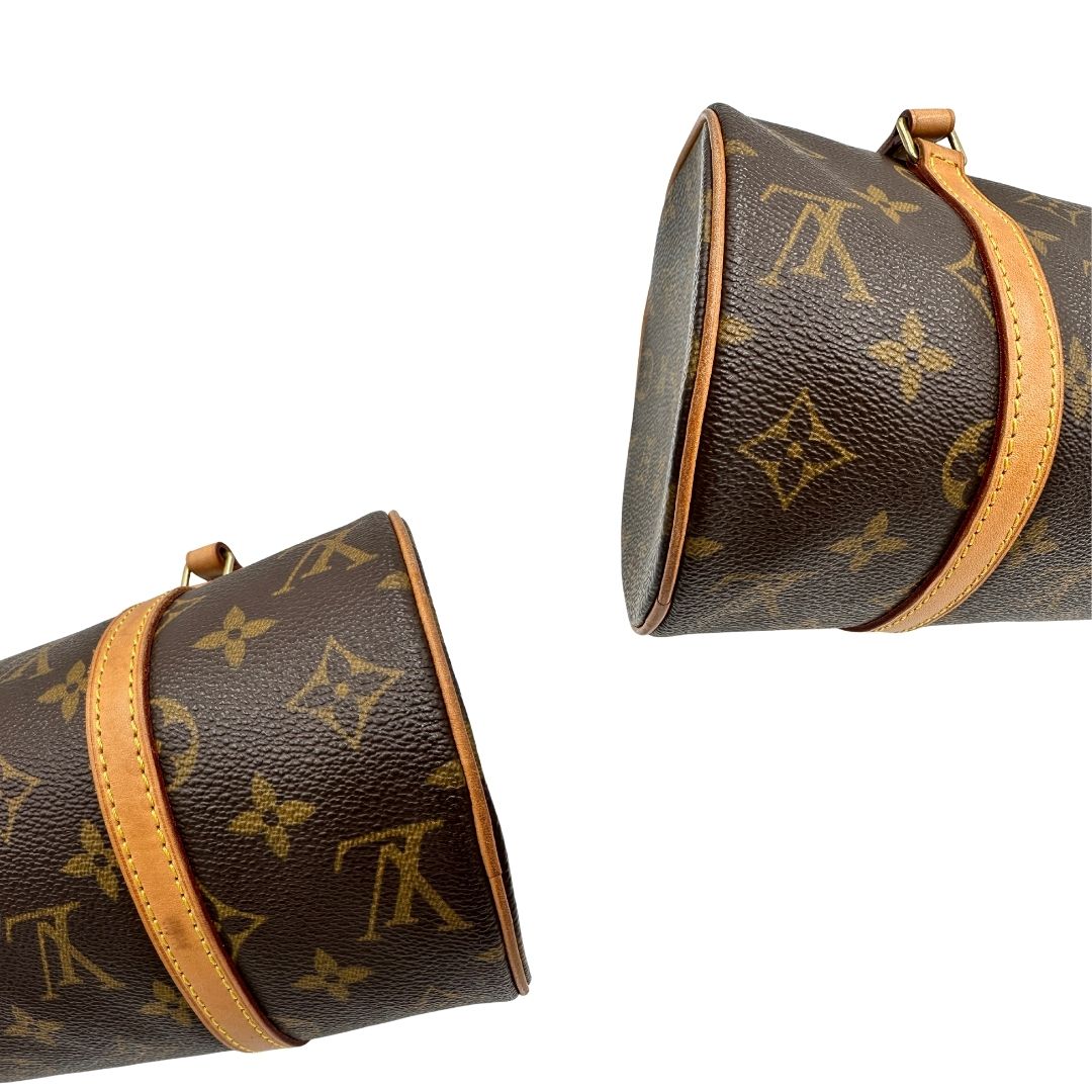 angoli Borsa L.V. in canvas marrone monogram con finiture in vacchetta naturale e parti metalliche dorate; munita di doppi manici, indossabile a spalla, di lusso, originale, ottime condizioni, usata.