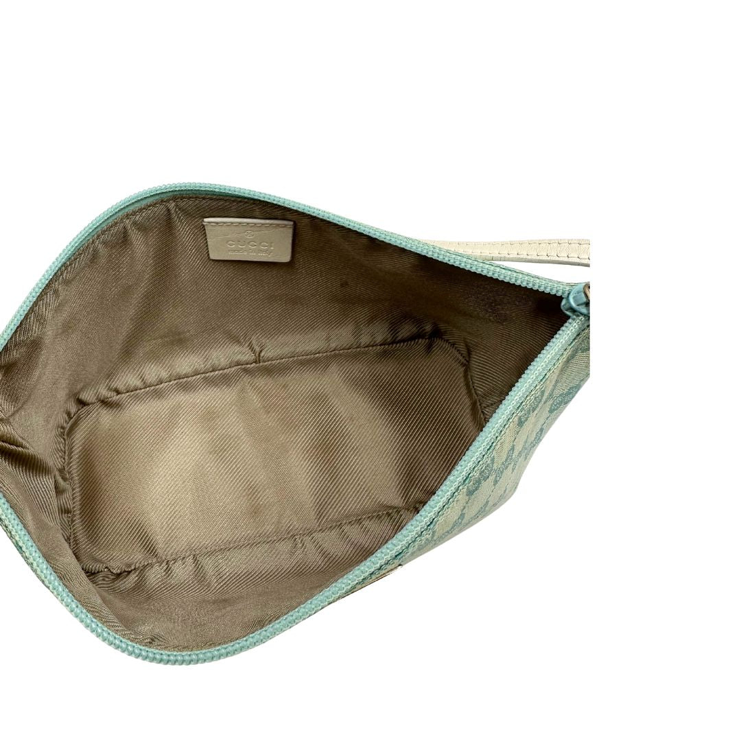 interno  Borsa Gucci in tessuto celeste GG con finiture in pelle bianche e parti metalliche dorate, munita di un manico singolo, di lusso, originale, ottime condizioni. 