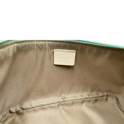 interno  Borsa Gucci in tessuto celeste GG con finiture in pelle bianche e parti metalliche dorate, munita di un manico singolo, di lusso, originale, ottime condizioni. 