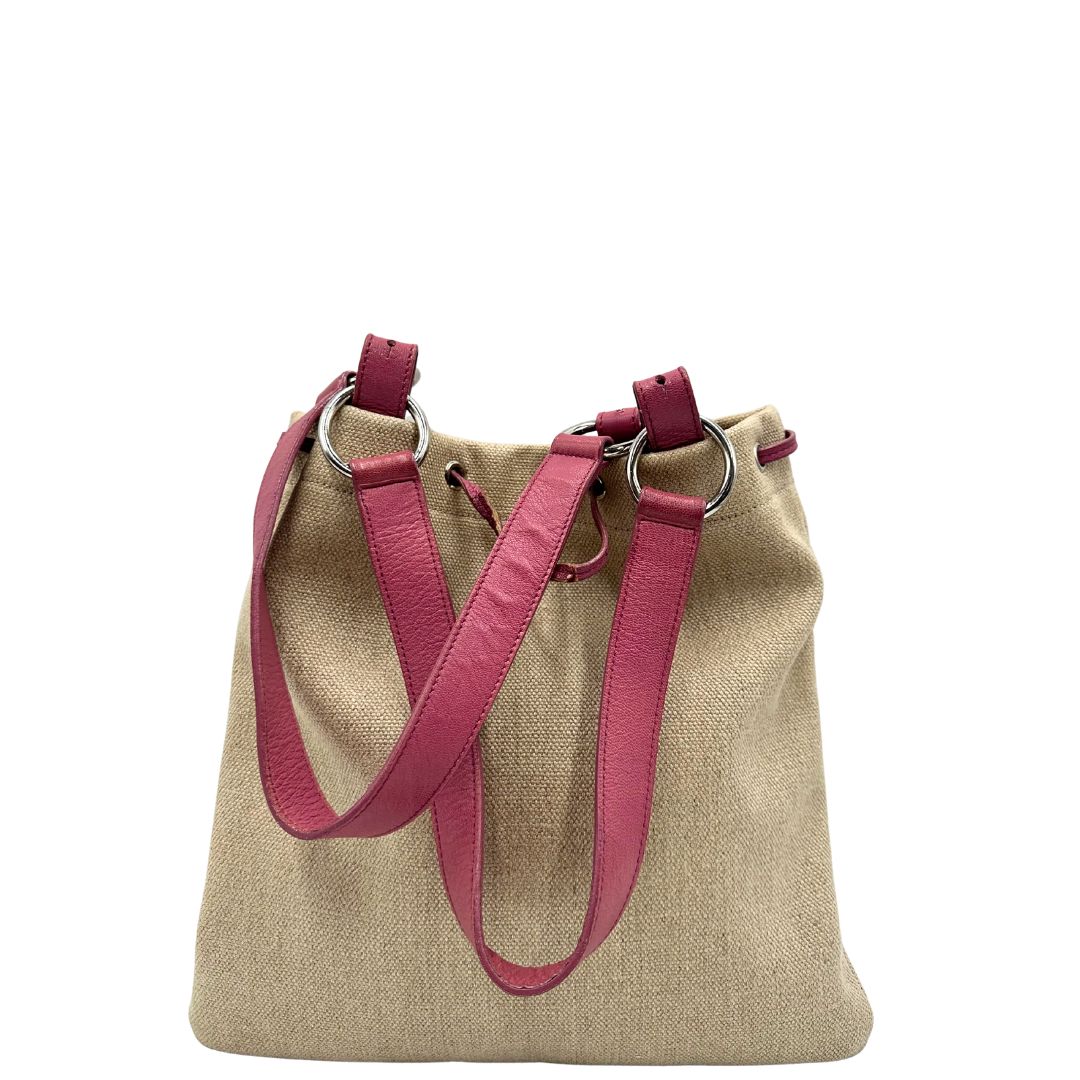 retro Borsa Saint Laurent in tessuto beige con decorazioni a forma di cuori rosa in pelle; munita di doppi manici. Completa di dustbag, di lusso, originale, ottime condizioni, usata. 
