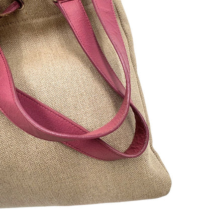 angolo Borsa Saint Laurent in tessuto beige con decorazioni a forma di cuori rosa in pelle; munita di doppi manici. Completa di dustbag, di lusso, originale, ottime condizioni, usata. 