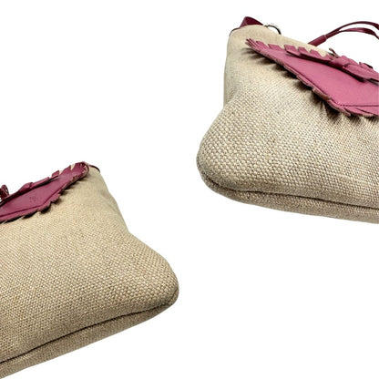 angoli Borsa Saint Laurent in tessuto beige con decorazioni a forma di cuori rosa in pelle; munita di doppi manici. Completa di dustbag, di lusso, originale, ottime condizioni, usata.