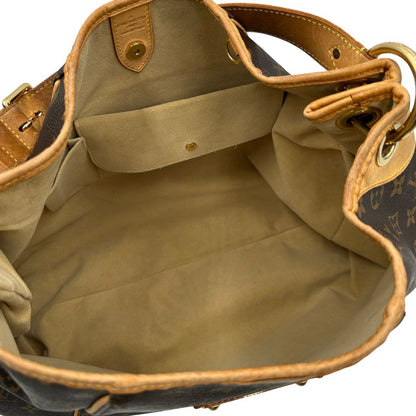 interno Borsa Louis Vuitton in canvas marrone monogram con finiture in vacchetta naturale e parti metalliche dorate; munita di un manico singolo leggermente regolabile, di lusso, originale, ottime condizioni, usata. 