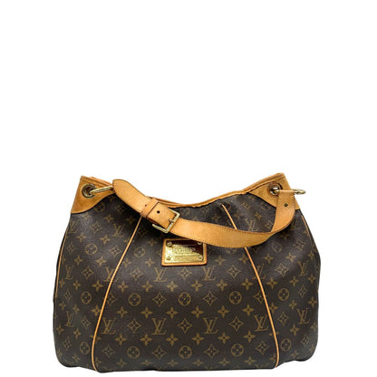 front Borsa Louis Vuitton in canvas marrone monogram con finiture in vacchetta naturale e parti metalliche dorate; munita di un manico singolo leggermente regolabile, di lusso, originale, ottime condizioni, usata. 
