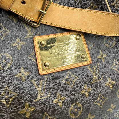 logo Borsa Louis Vuitton in canvas marrone monogram con finiture in vacchetta naturale e parti metalliche dorate; munita di un manico singolo leggermente regolabile, di lusso, originale, ottime condizioni, usata.