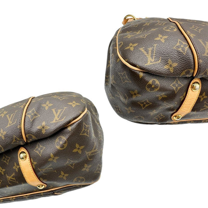 angoli Borsa Louis Vuitton in canvas marrone monogram con finiture in vacchetta naturale e parti metalliche dorate; munita di un manico singolo leggermente regolabile, di lusso, originale, ottime condizioni, usata. 