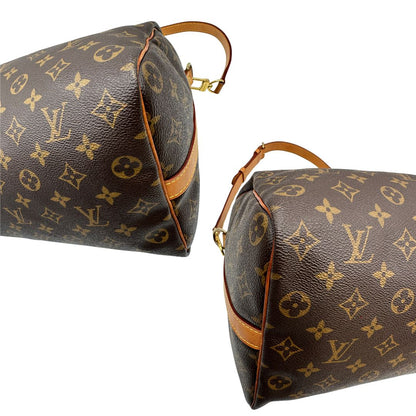 angoli Borsa Speedy 35 in canvas marrone monogram con finiture in vacchetta naturale e parti metalliche dorate; munita di doppi manici stondati e una tracolla amovibile e regolabile. Completa di lucchetto e dustbag, di lusso, originale, ottime condizioni. 