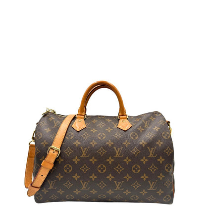 front Borsa Speedy 35 in canvas marrone monogram con finiture in vacchetta naturale e parti metalliche dorate; munita di doppi manici stondati e una tracolla amovibile e regolabile. Completa di lucchetto e dustbag, di lusso, originale, ottime condizioni. 