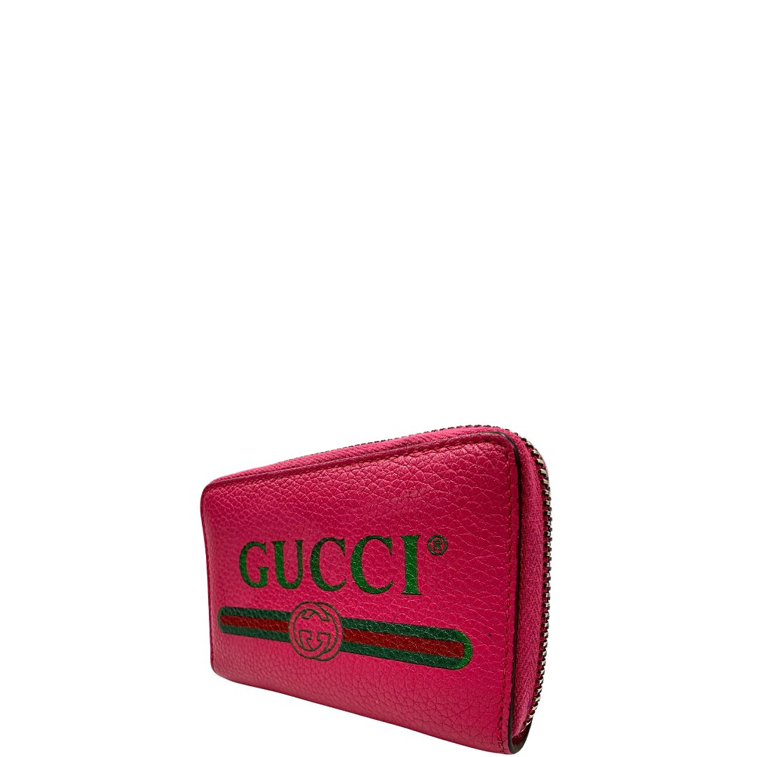 lato Portafoglio Gucci in pelle fucsia con dettagli Web verdi e rossi. Completo di scatola, di lusso, originale, ottime condizioni.