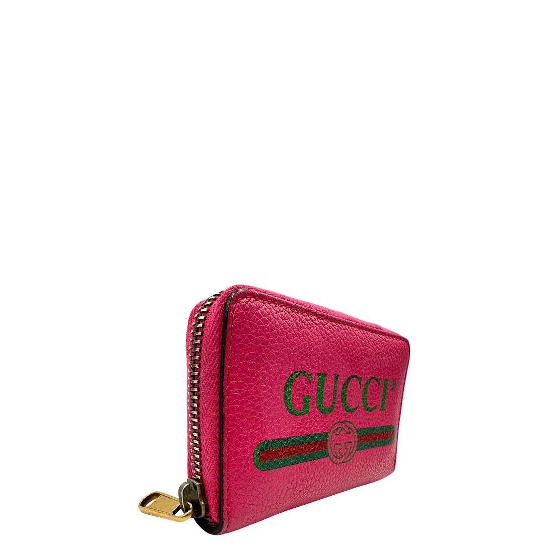 lato Portafoglio Gucci in pelle fucsia con dettagli Web verdi e rossi. Completo di scatola, di lusso, originale, ottime condizioni. 