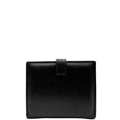 Agenda Gucci in pelle nera con parti metalliche dorate, munita di un pennino, di lusso, originale