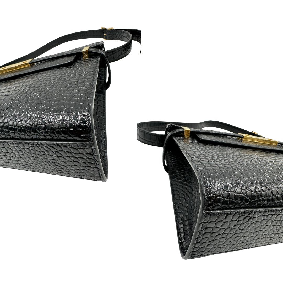 Angoli di una Borsa Saint Laurent in pelle nera in trama cocco con parti metalliche dorate. Munita di una tracolla regolabile con fibbia. Originale, usata, di lusso, in ottime condizioni.