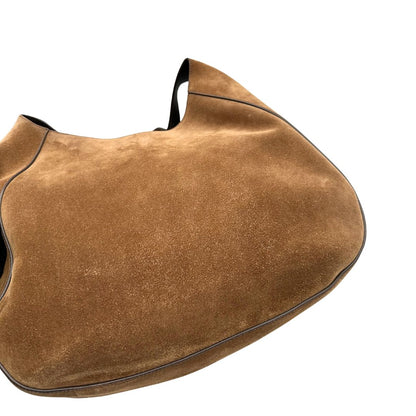 segni di utilizzo Borsa Prada in pelle scamosciata marrone con parti metalliche dorate; munita di un manico singolo regolabile; indossabile a spalla o a tracolla. Completa di dustbag, di lusso, originale, ottime condizioni, usata. 