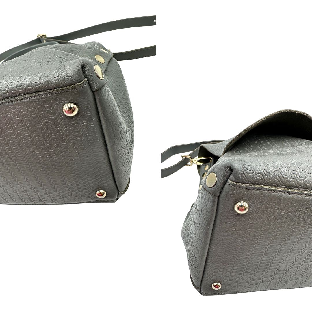 angoli Borsa Zanellato in pelle trama blandine grigia con parti metalliche argentate; munita di un manico singolo e una tracolla amovibile e regolabile, di lusso, originale, ottime condizioni, usata. 