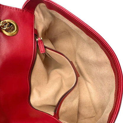 interno Borsa Gucci Marmont in pelle matelassè rossa e parti metalliche dorate; munita di una tracolla in catena con spallaccio in pelle, di lusso, originale, ottime condizioni. 