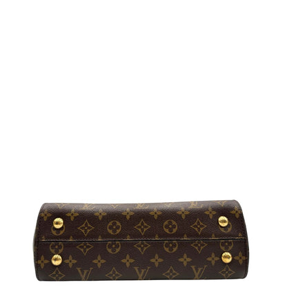 Base di una Borsa Louis Vuitton in canvas marrone monogram con finiture in vacchetta naturale e parti metalliche dorate; munita di un manico singolo e una tracolla bicolore, blu e marrone, amovibile. Completa di scatola, di lusso, originale, ottime condizioni. 