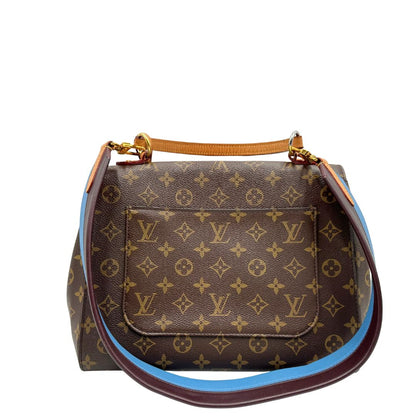 retro Borsa Louis Vuitton in canvas marrone monogram con finiture in vacchetta naturale e parti metalliche dorate; munita di un manico singolo e una tracolla bicolore, blu e marrone, amovibile. Completa di scatola, di lusso, originale, ottime condizioni. 