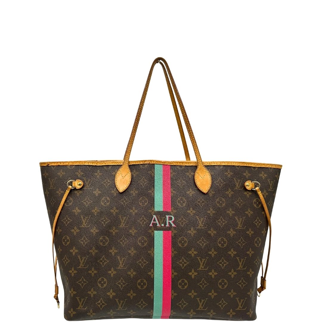 front Borsa Louis Vuitton Neverfull GM in canvas marrone monogram con finiture in vacchetta naturale; munita di doppi manici, indossabile a spalla. Completa di dustbag, di lusso, originale, ottime condizioni, usata. 