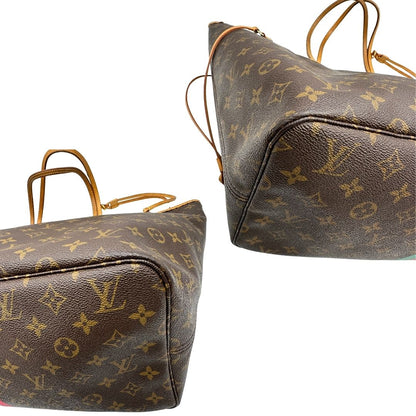 angoli della Borsa Louis Vuitton Neverfull GM in canvas marrone monogram con finiture in vacchetta naturale; munita di doppi manici, indossabile a spalla. Completa di dustbag, di lusso, originale, ottime condizioni, usata.