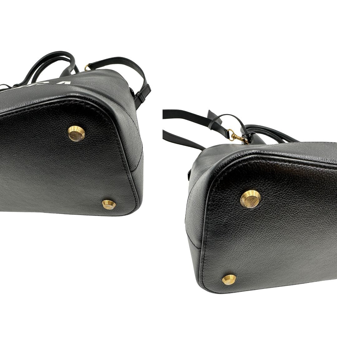 Angoli di una Borsa Balenciaga in pelle martellata nera con parti metalliche dorate, munita di doppi manici e una tracolla amovibile e regolabile. Completa di dustbag e cartellini, lucchetto e chiavi. Originale, usata, di lusso, in ottime condizioni.