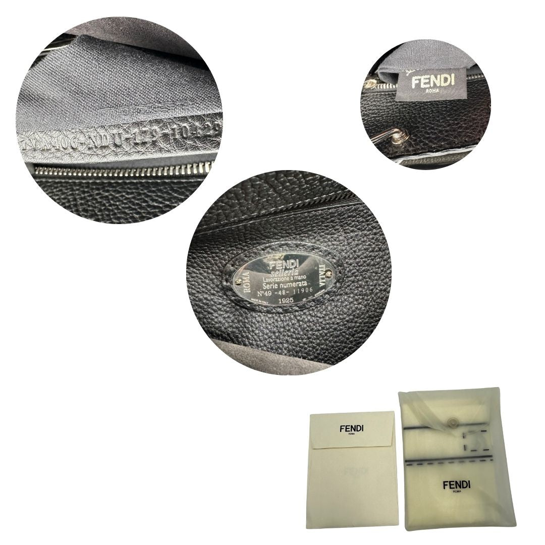 Cartella Fendi in cuoio romano nero con parti metalliche argentate; munita di un manico singolo e una tracolla amovibile, di lusso, originale, usata.